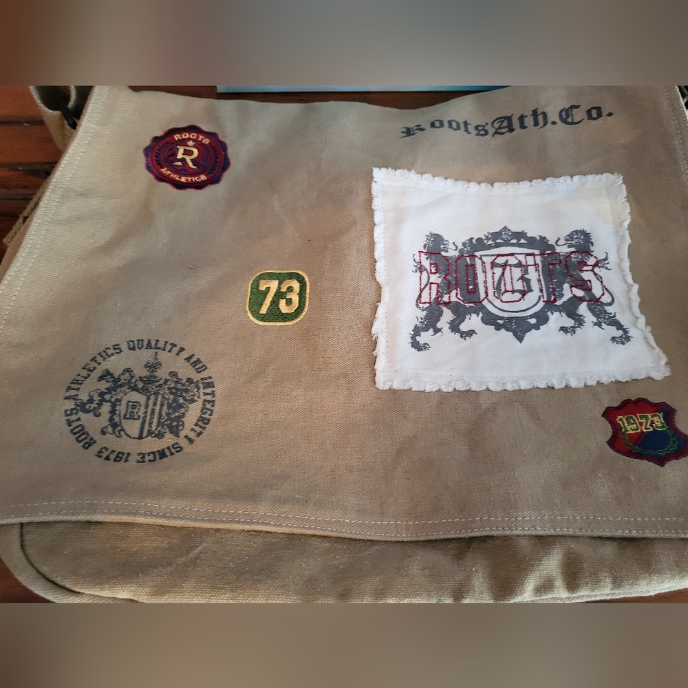 Roots canvas messenger bag with patches (EUC)